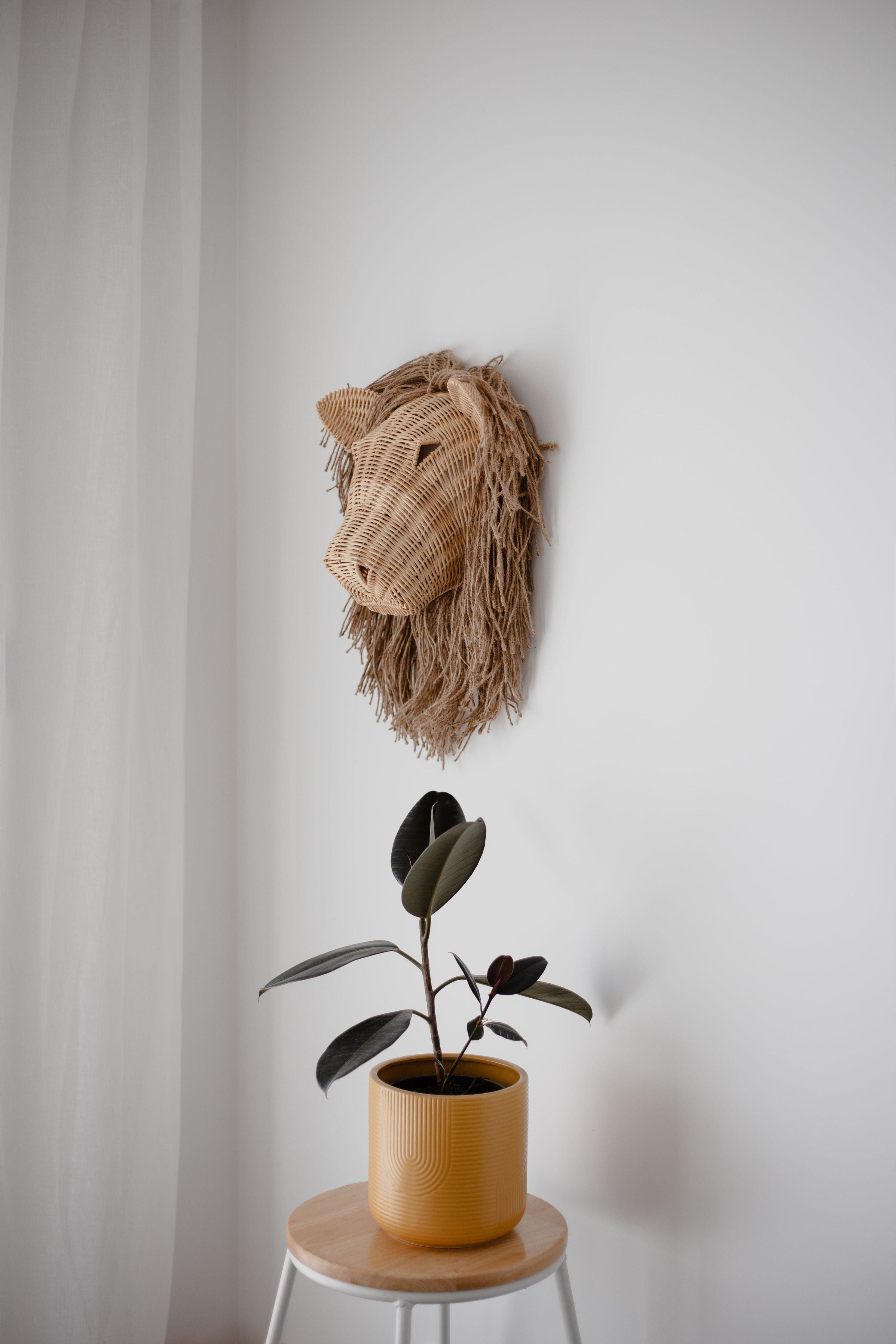 inkah rattan lion wall hanging