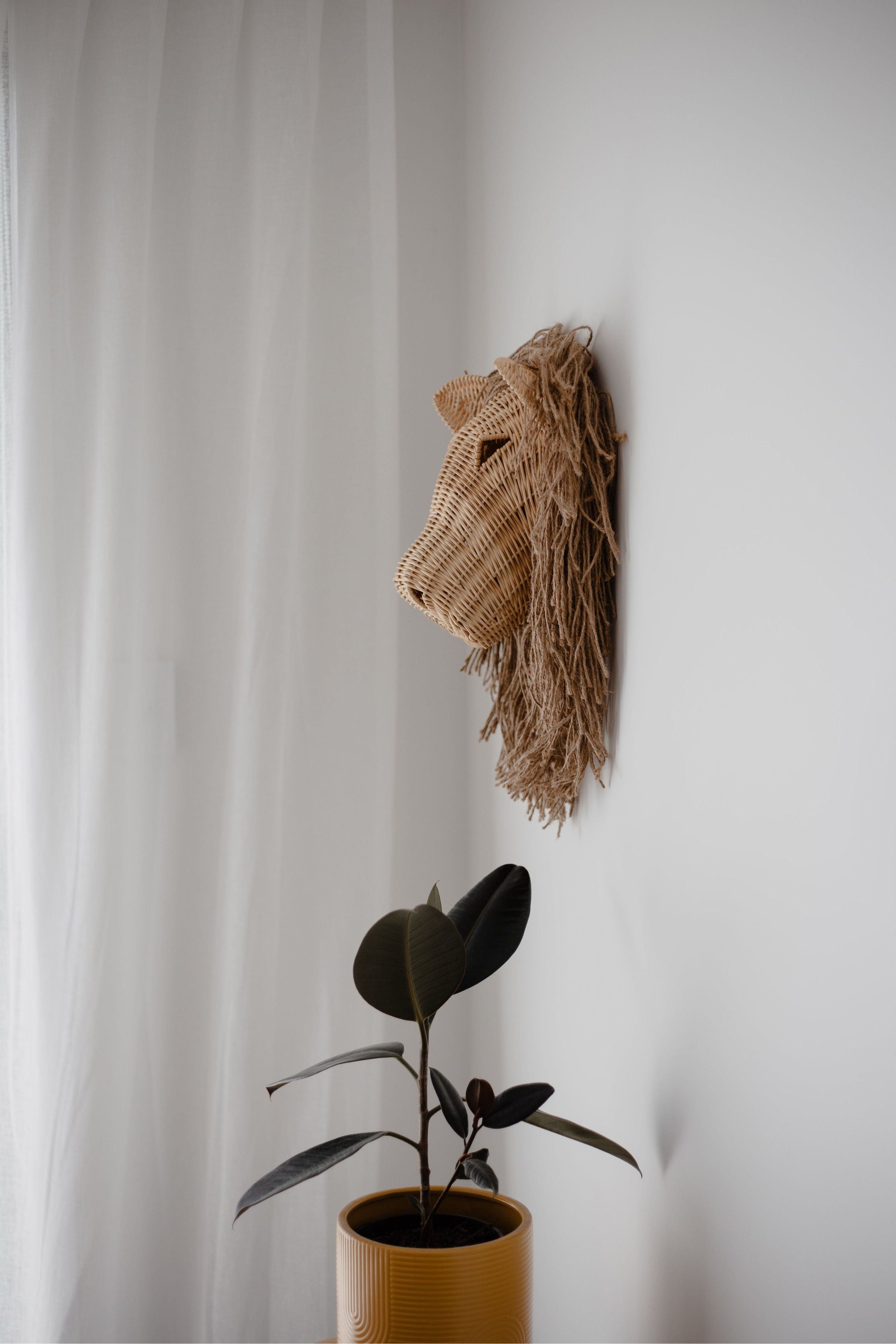 inkah rattan lion wall hanging