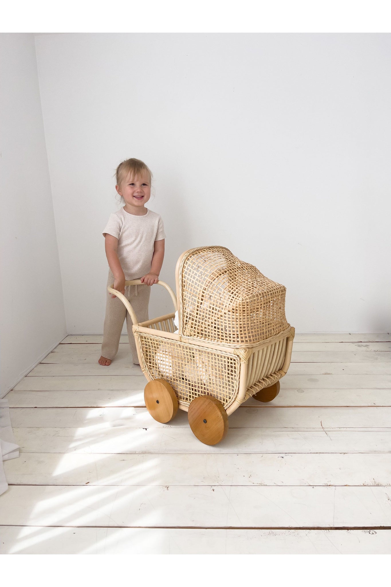 inkah rattan dolls pram