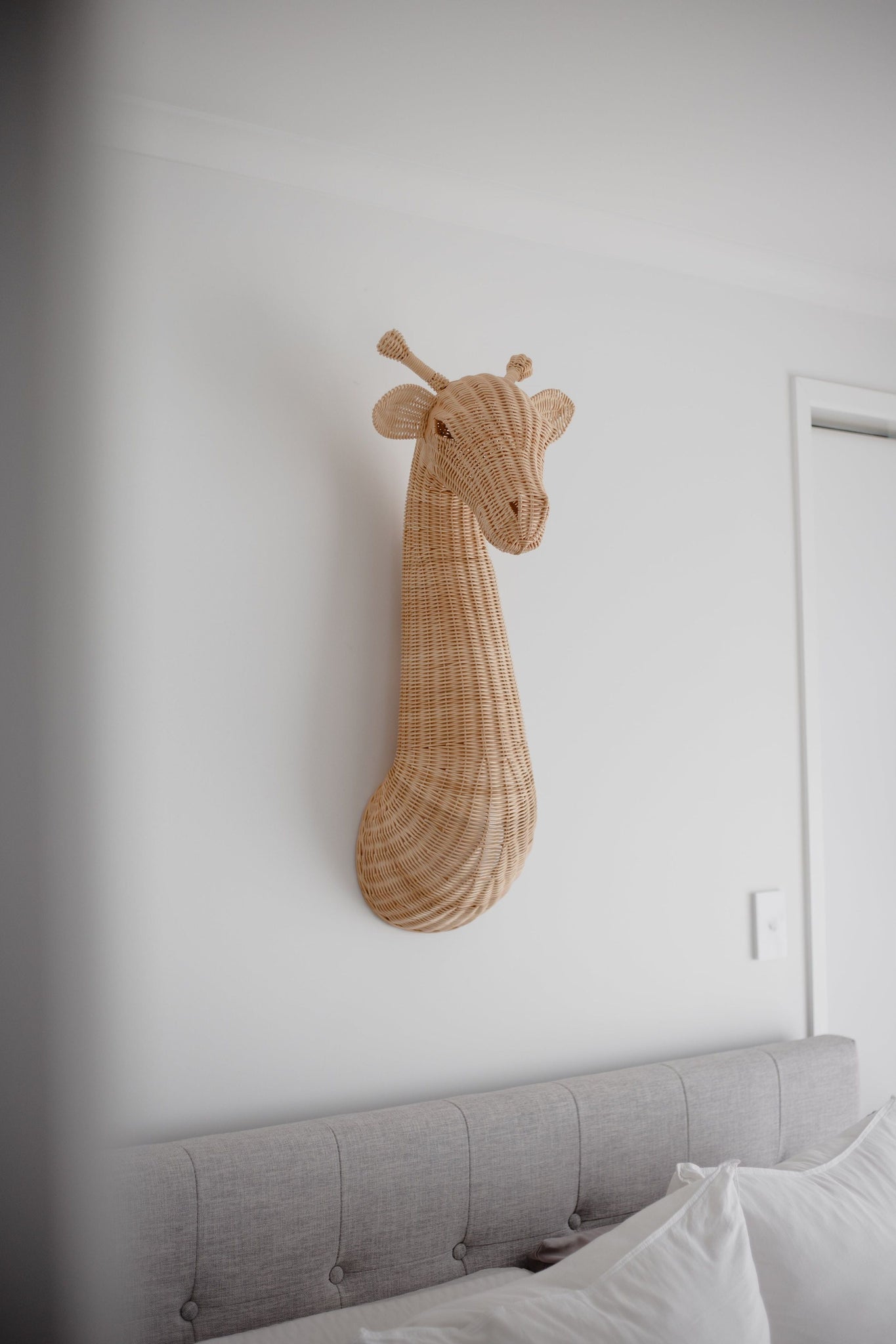 inkah rattan giraffe wall hanging